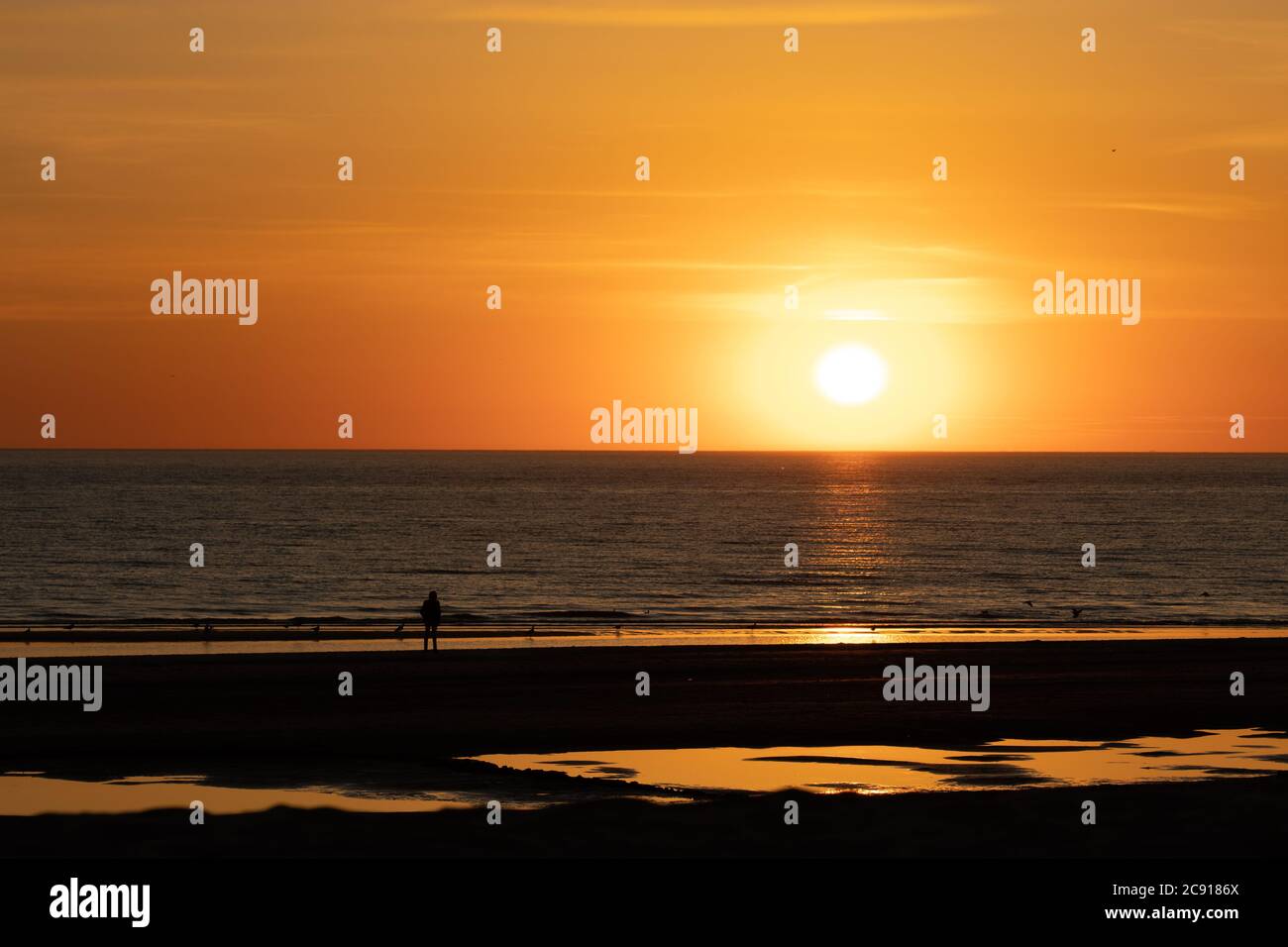 Sundown at the Beach Stock Photo