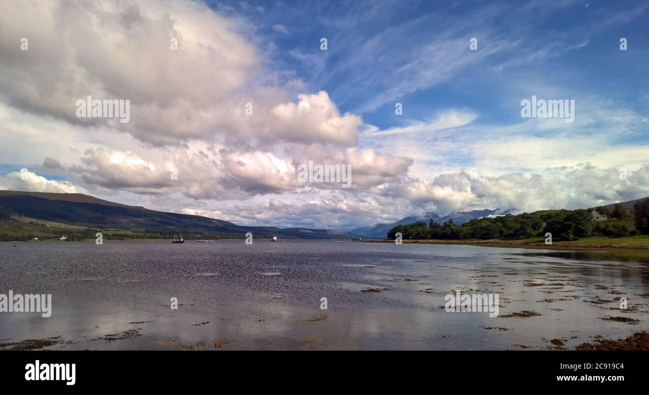 An interest cloud formation above a Scottish Loch Stock Photo