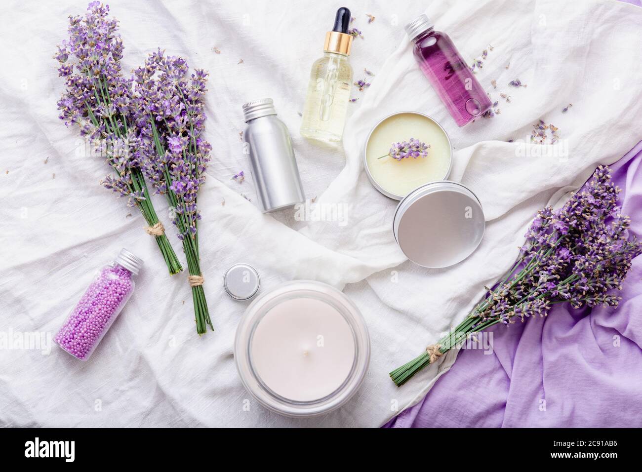 dry lavender flowers and lavender aromatic sea salt with candle - natural  skin care spa 11034601 Stock Photo at Vecteezy