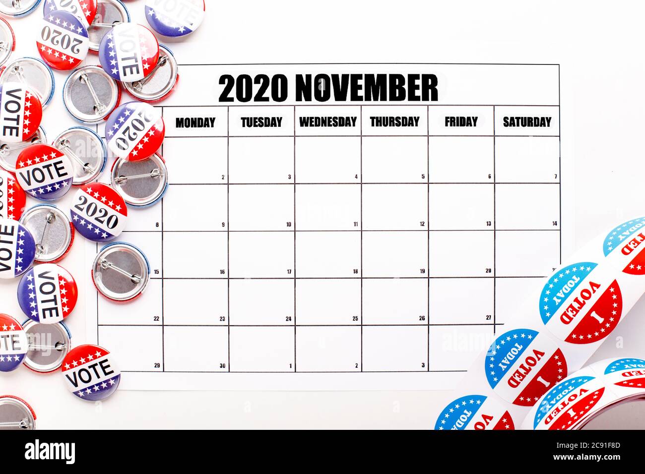 Calendar with copy space, pins and stickers with patriotic text I voted