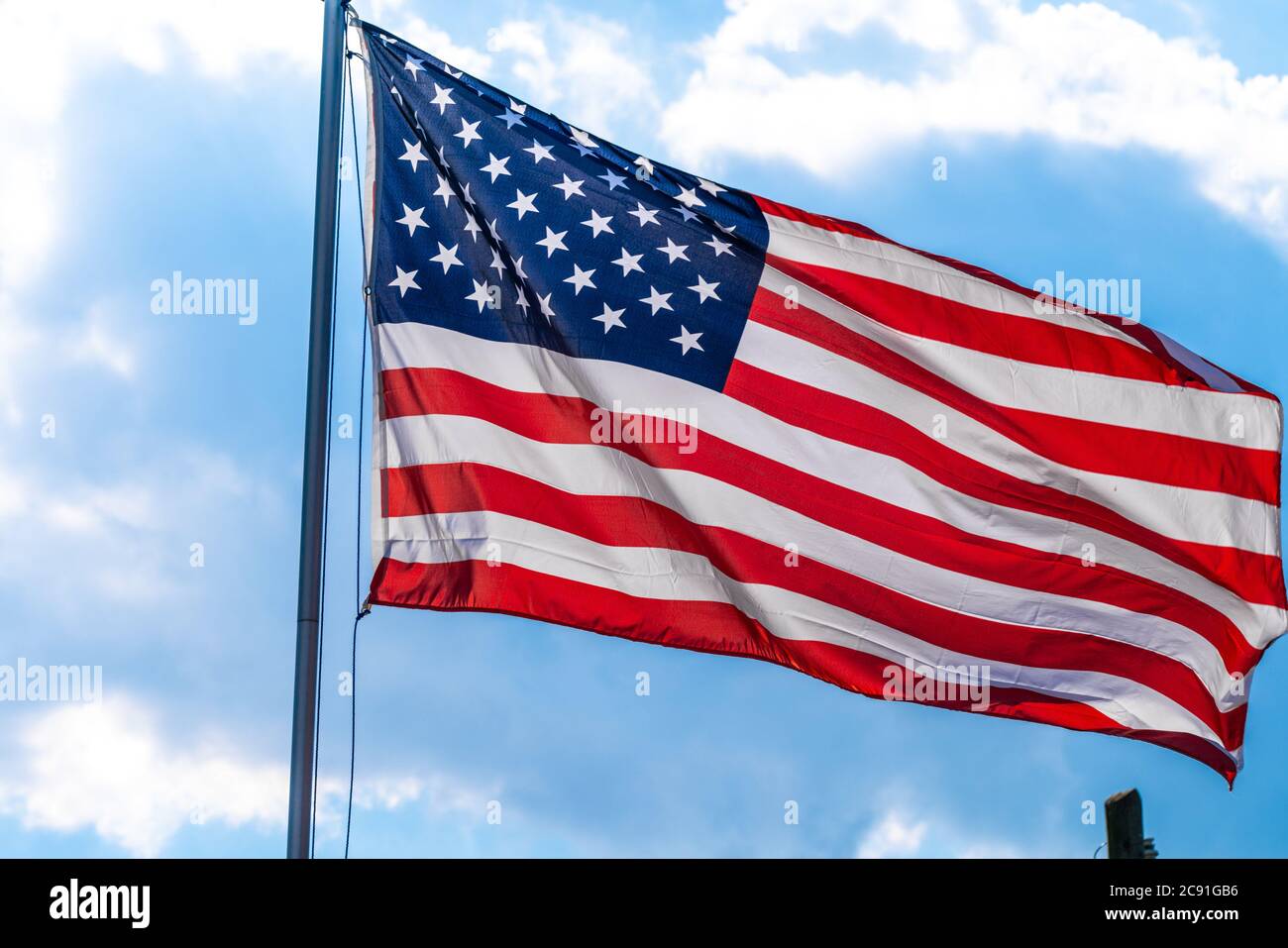 18.07.2020, Berlin, Stars and Stripes, a waving flag of the United ...