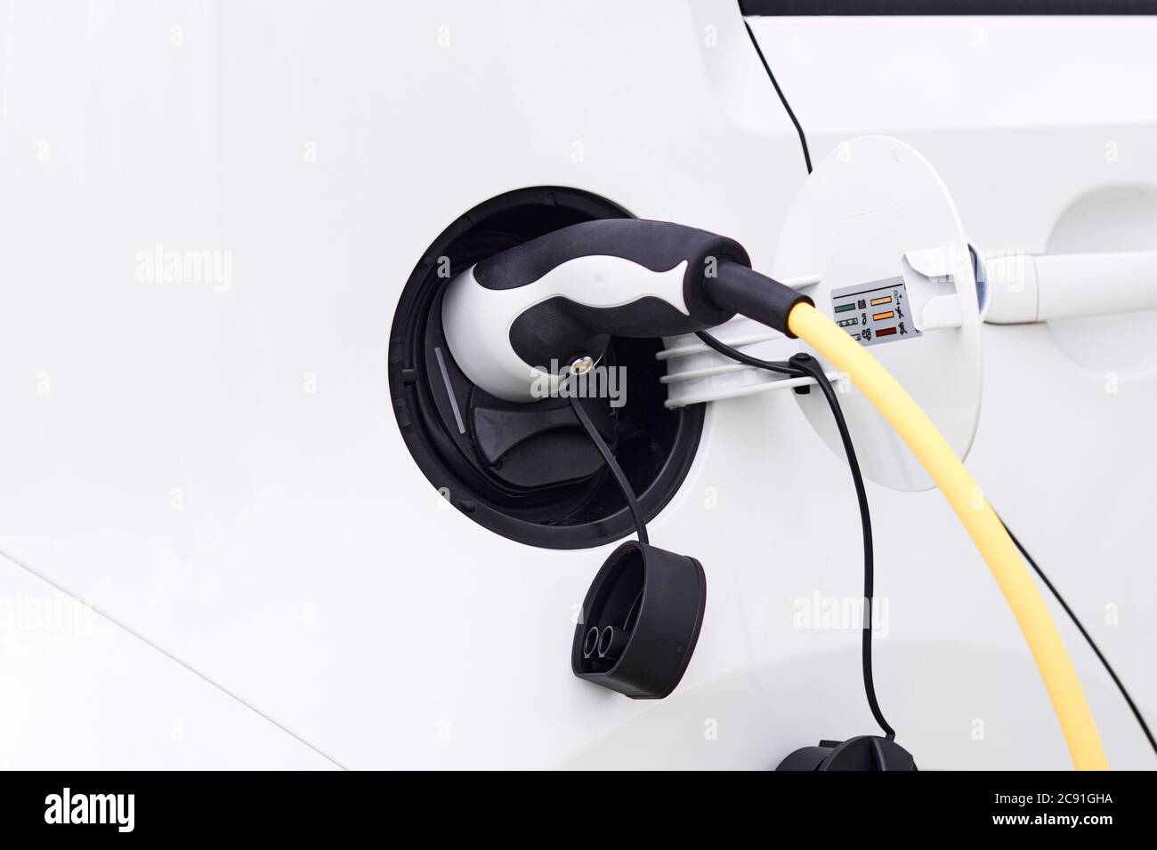 Power supply for electric car at a public or home charging station