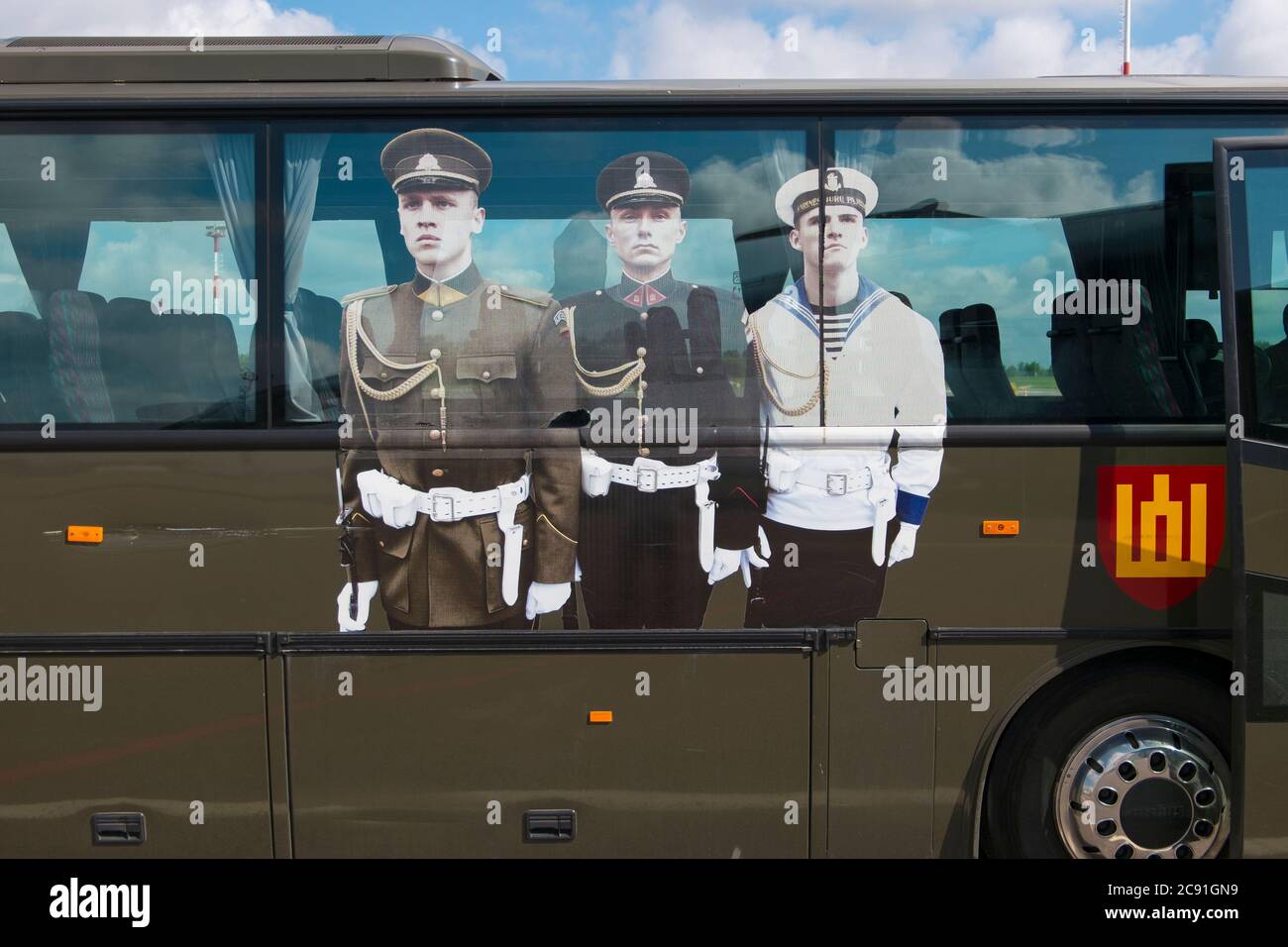 Pictures of Lithuanian military officers on a transport bus.  On the Tarmac at the Vilnius International Airport in Lithuania. Stock Photo