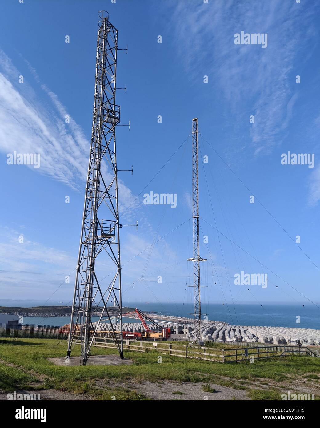 Radio Antenna overlooking Harbor Construction Stock Photo