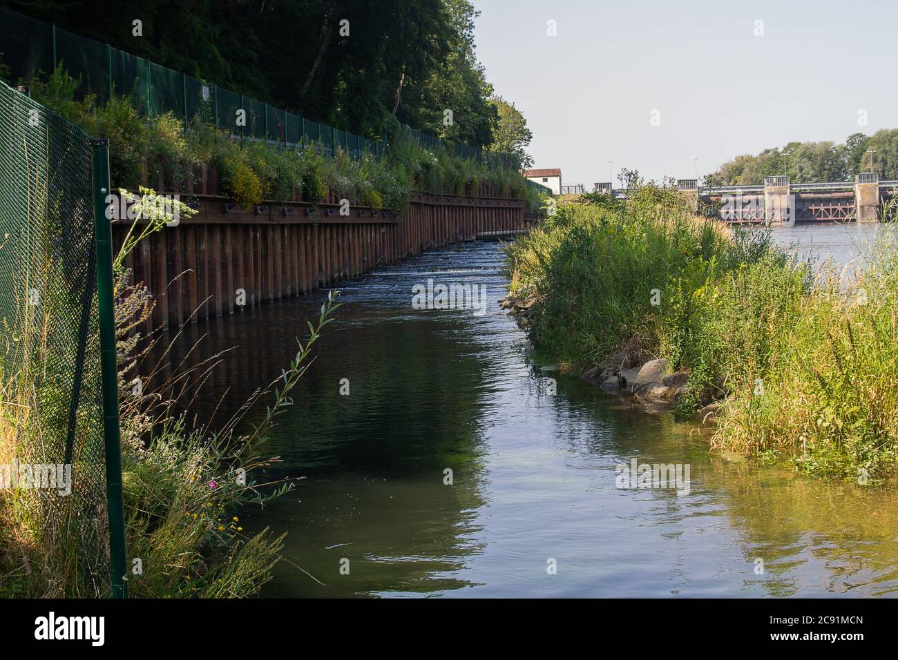 Here a fish ladder aid next to a hydroelectric power station. This allows fish to migrate upstream. Stock Photo