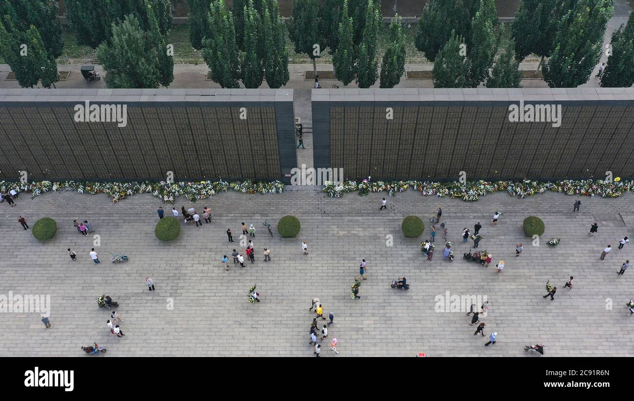 Tangshan. 28th July, 2020. People visit Tangshan Earthquake Ruins Memorial Park in Tangshan, north China's Hebei Province, July 28, 2020, the 44th anniversary of the 1976 Tangshan Earthquake. Credit: Dong Jun/Xinhua/Alamy Live News Stock Photo