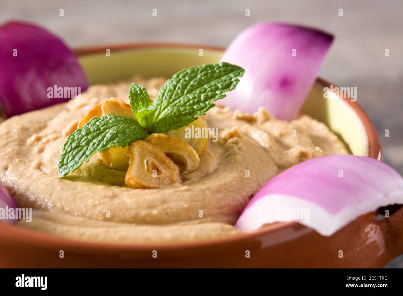 Gofio escaldado in bowl on wooden background Stock Photo