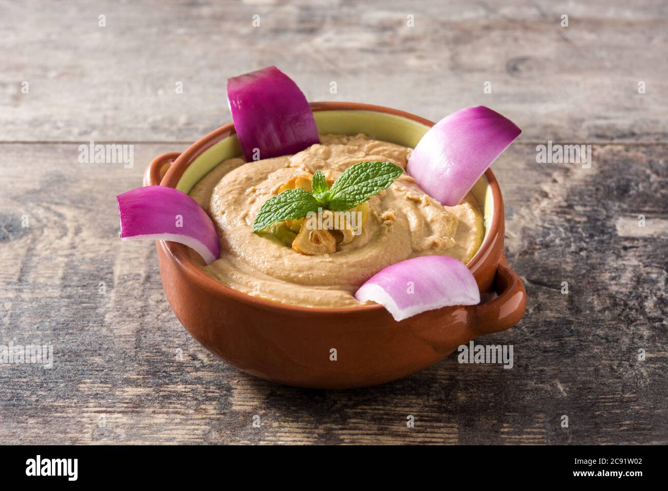 Gofio escaldado in bowl on wooden background Stock Photo