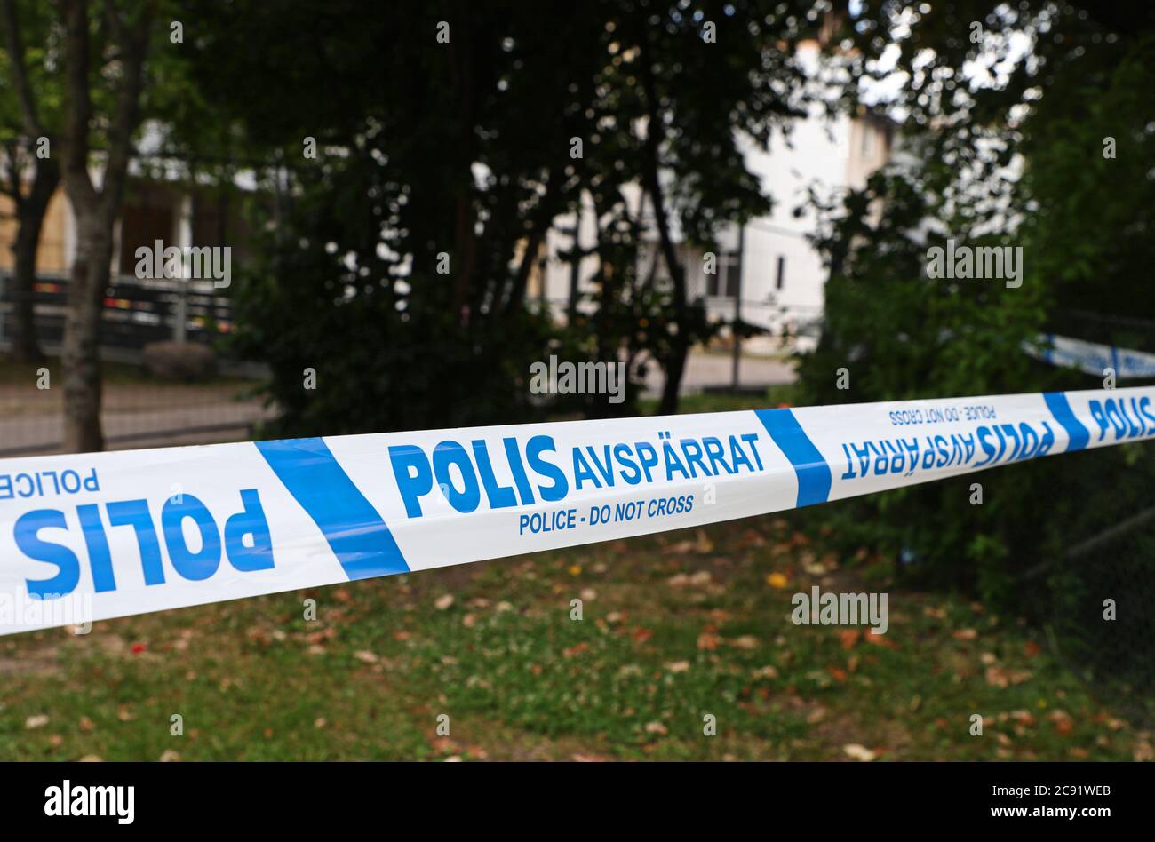Police barrier tape. Photo Jeppe Gustafsson Stock Photo