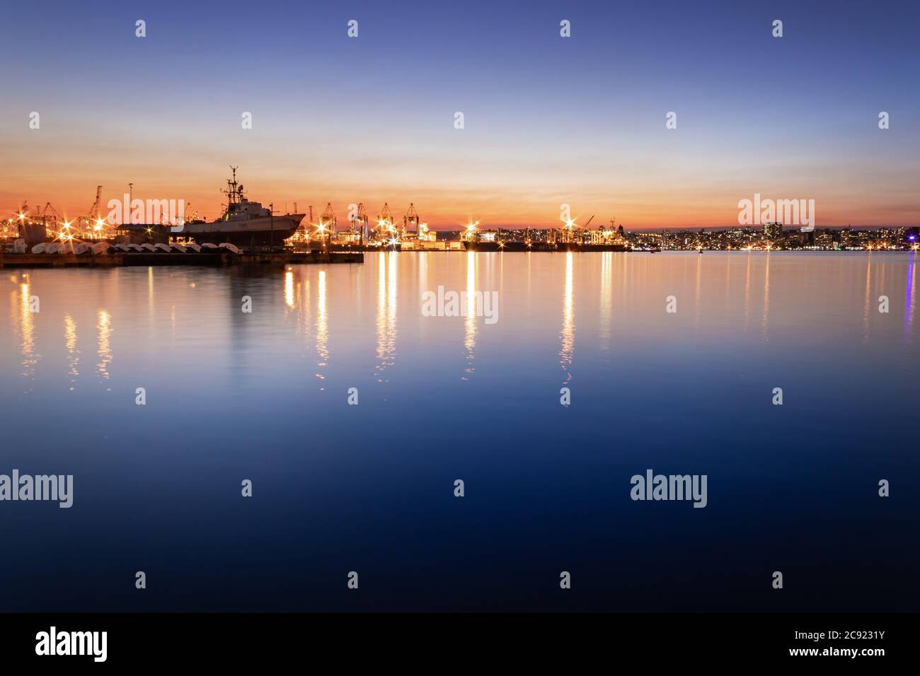 View of the ships in Durban harbor at sunset with colored lights