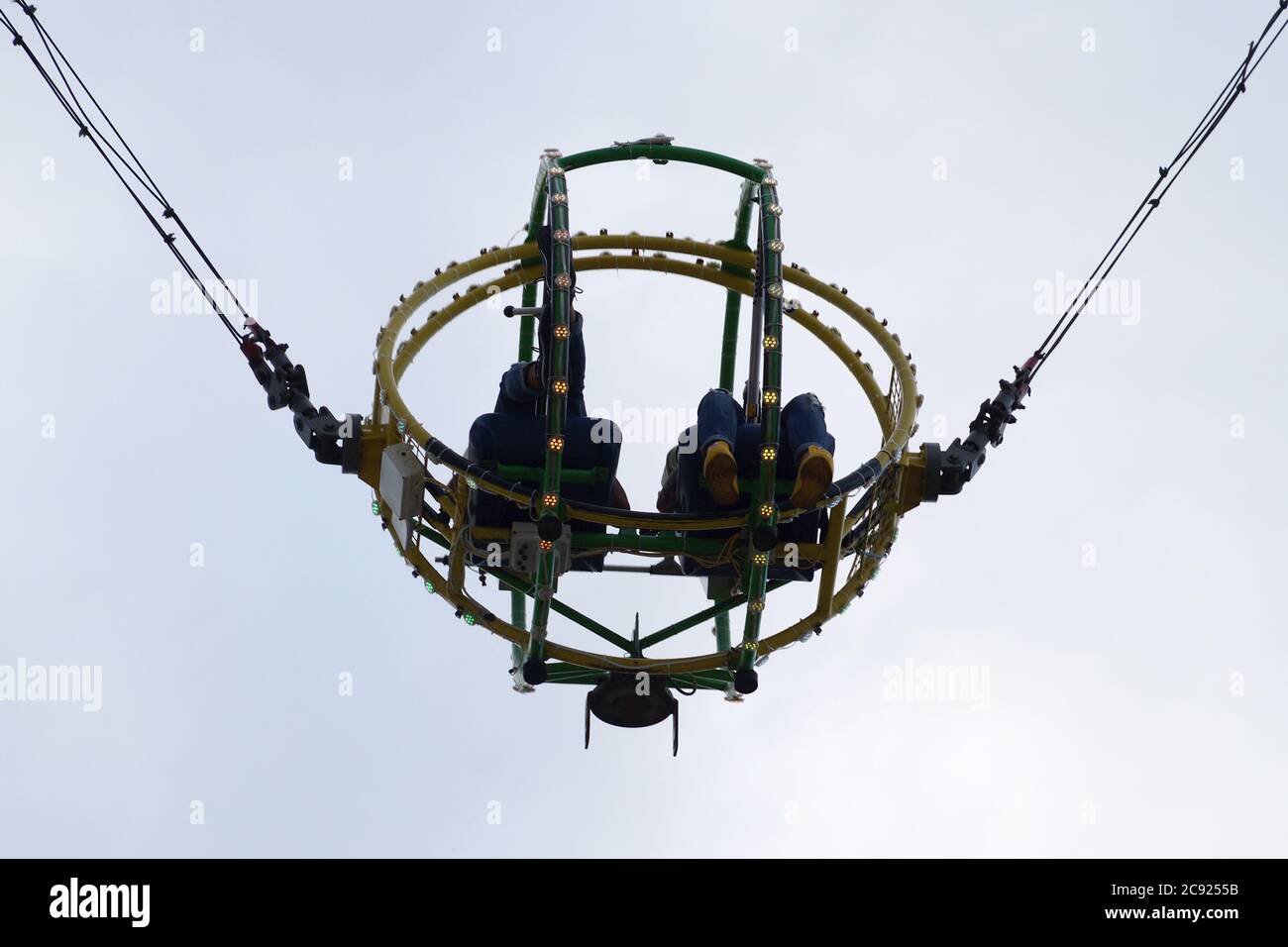 two people on the bungee ride bottom view Stock Photo