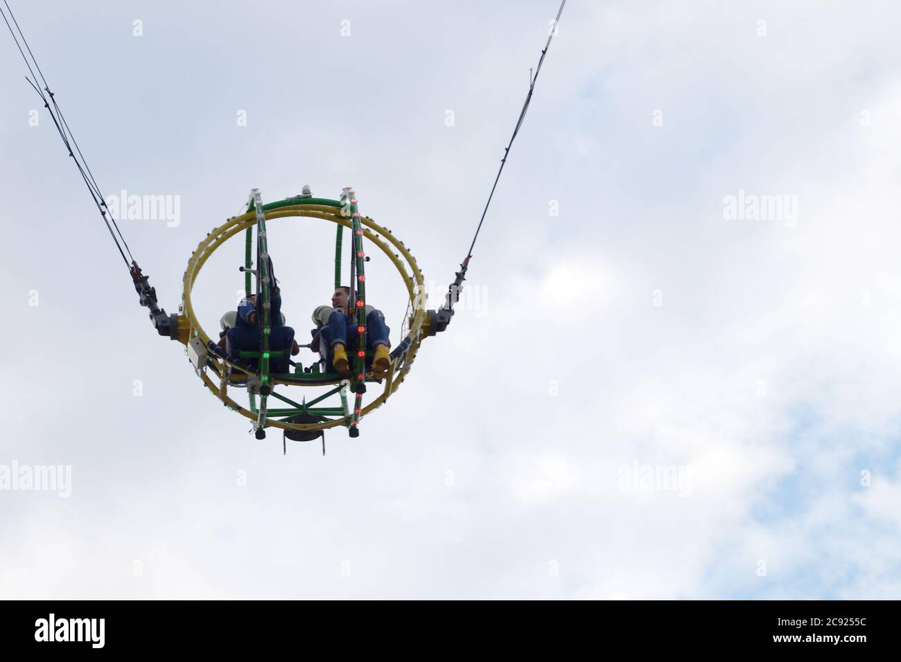 two people on the bungee ride bottom view Stock Photo