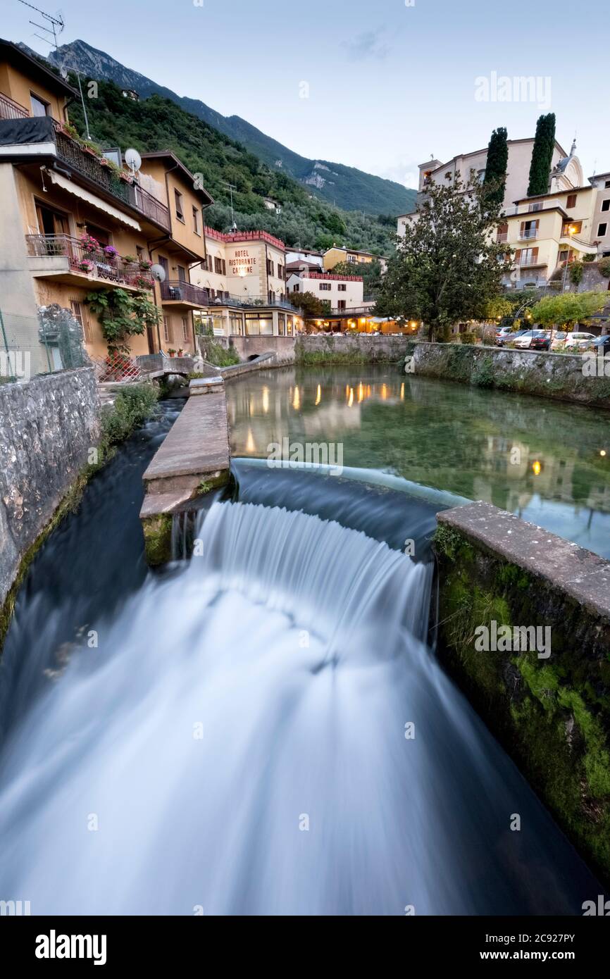 The Aril river in Cassone is only 175 meters long, it is the shortest river in Italy and one of the shortest in the world. Malcesine, Garda, Italy. Stock Photo
