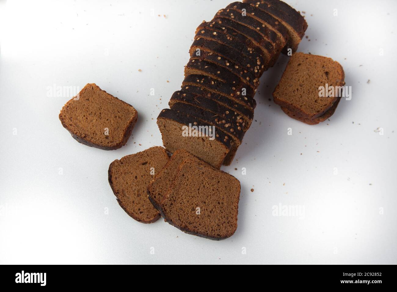 Fresh brown bread slice isolated on white background Stock Photo - Alamy