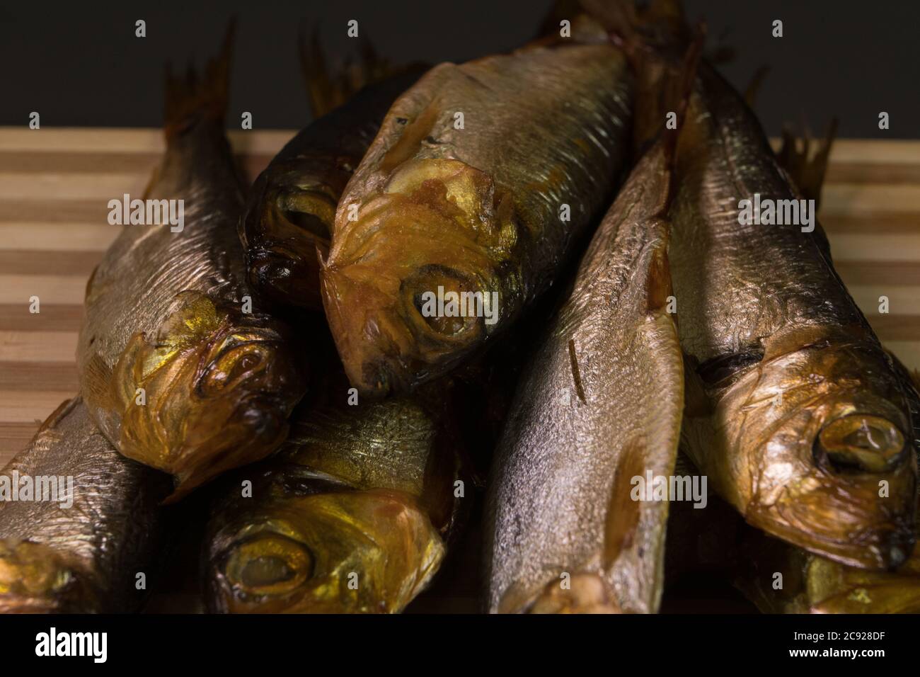background of golden smokedried fish close up Stock Photo Alamy