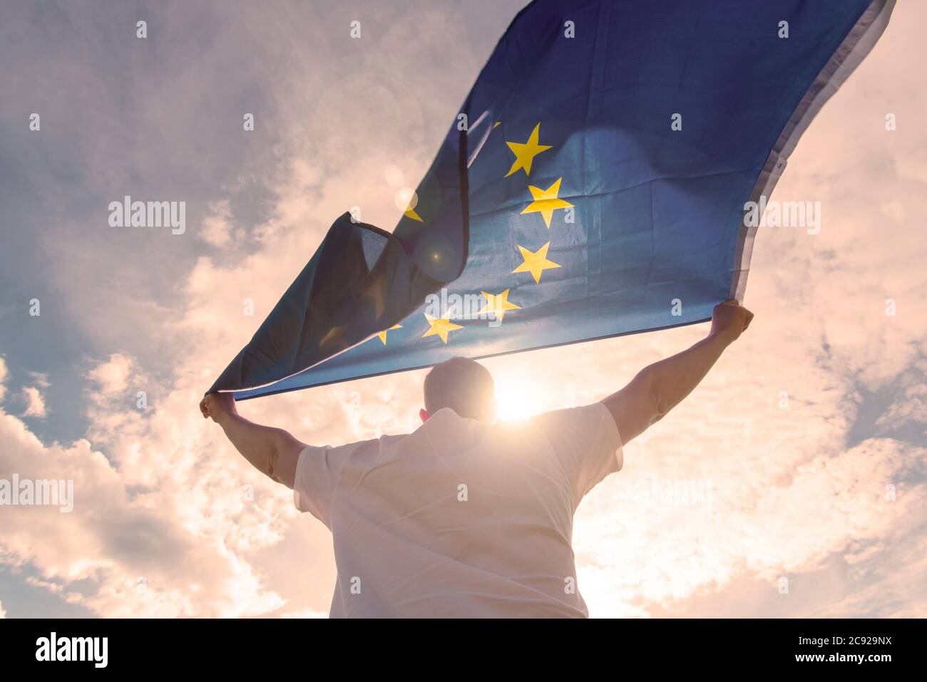 Man holding EU Flag or European Union flag, concept picture Stock Photo