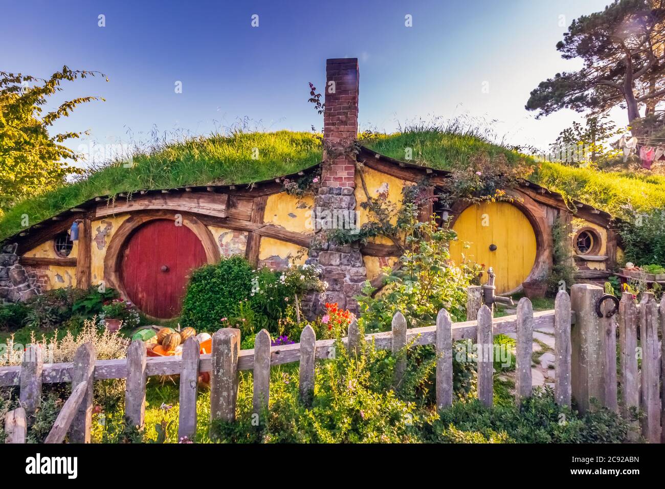 Entrance to the house with round door at the Hobbiton, New Zealand. The place where hobbits live in their holes. Stock Photo