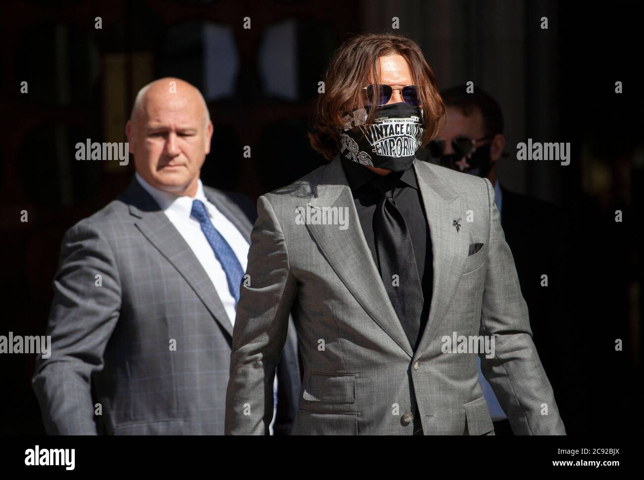 London, UK. 28th July 2020. Hollywood actor and musician, Johnny Depp, arrives at the high court on day 16 of his libel trial against The Sun's publishers NGN. Credit: Neil Atkinson/Alamy Live News Stock Photo