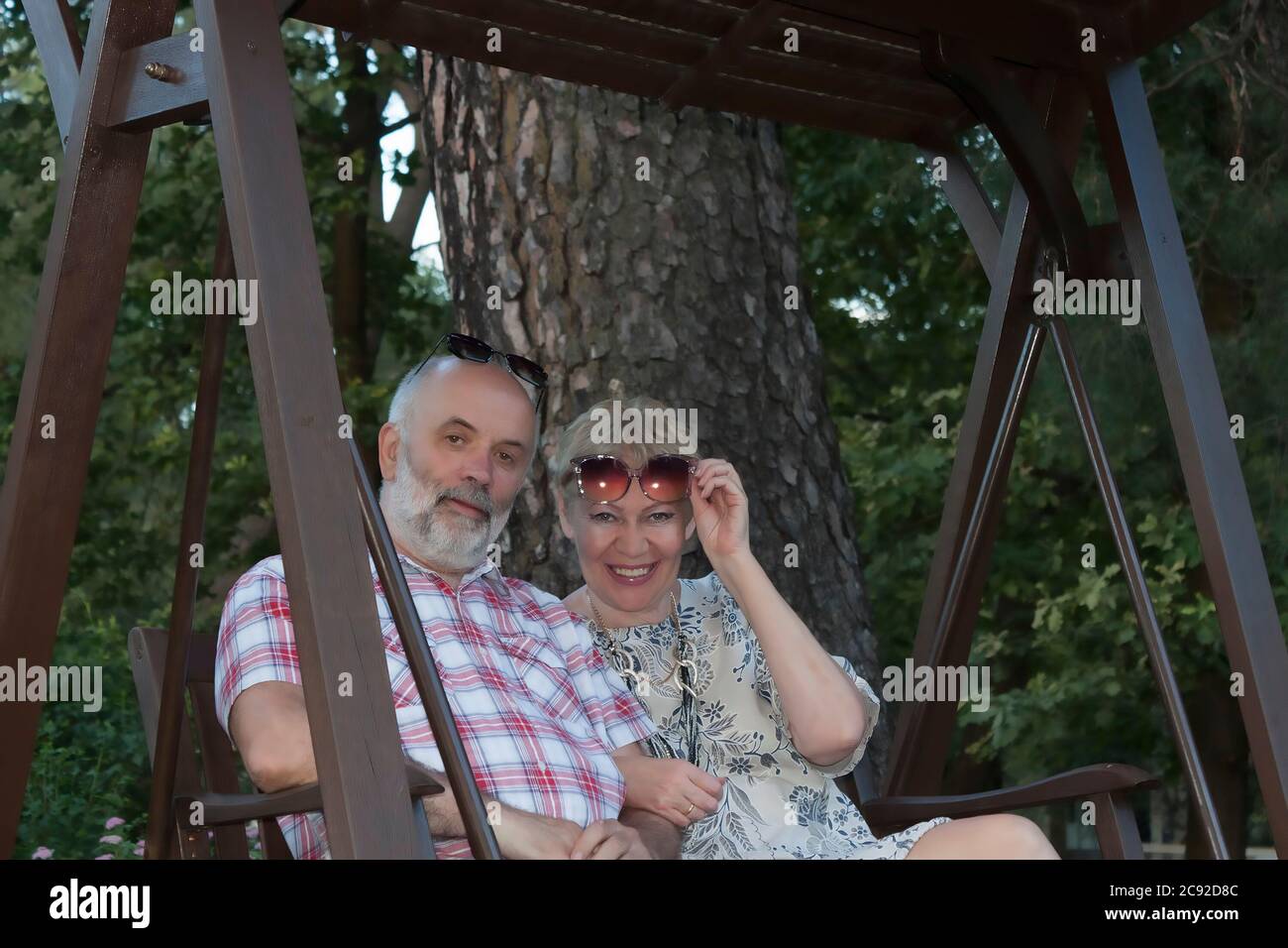 Mature couple swinging autumn hi-res stock photography and images - Alamy