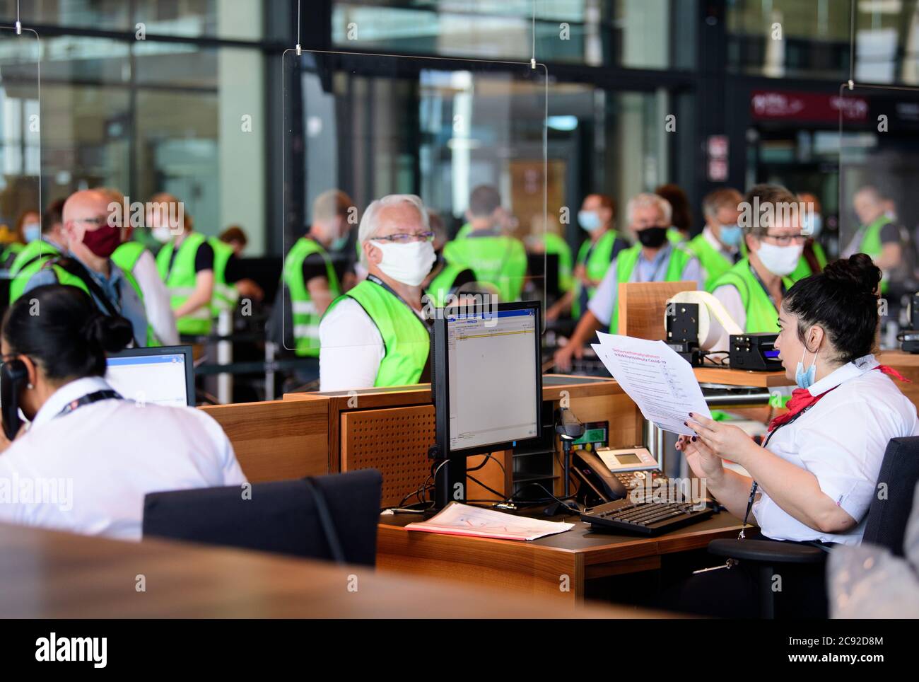 Airport security employees check passengers hires stock photography and images