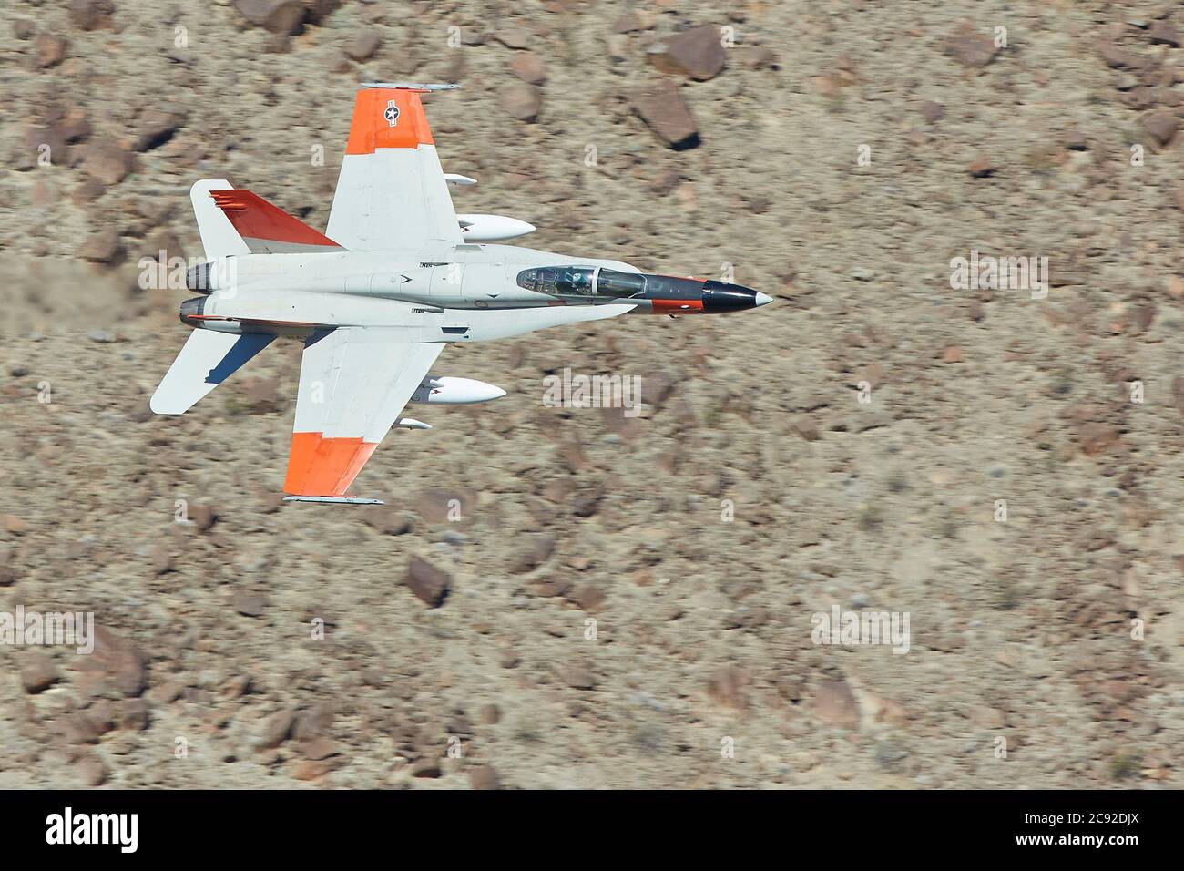 McDonnell Douglas F/A-18A Hornet From NAS China Lake, Flying At High-Speed And Low Level Through Rainbow Canyon, California, USA. Stock Photo