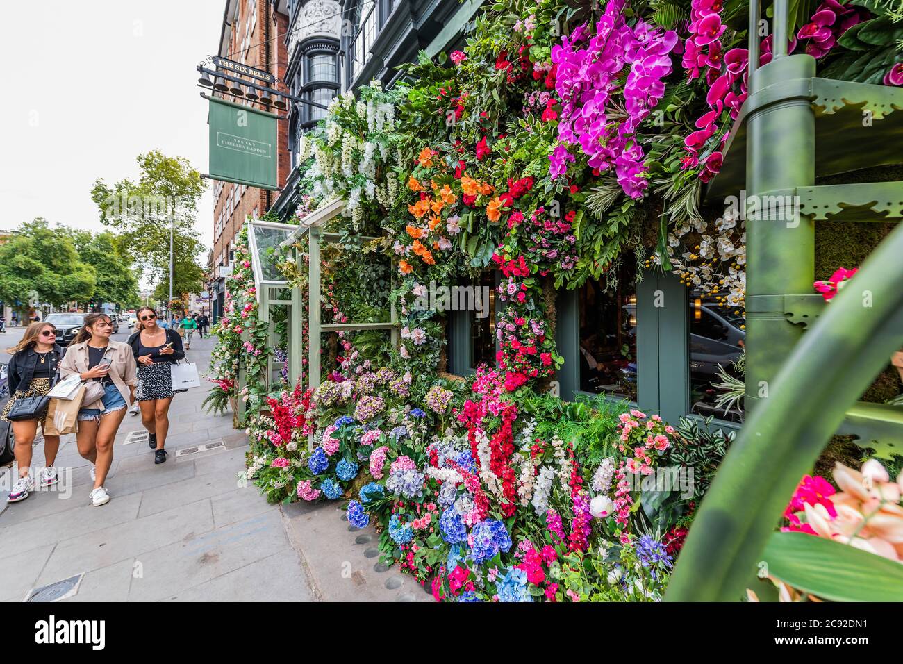 London, UK. 28th July, 2020. A trademark floral display to entertain passers-by and clients - The Ivy Chelsea Garden restaurant has reopened as the next stage of the easing of the Coronavirus Lockdown continues. Credit: Guy Bell/Alamy Live News Stock Photo