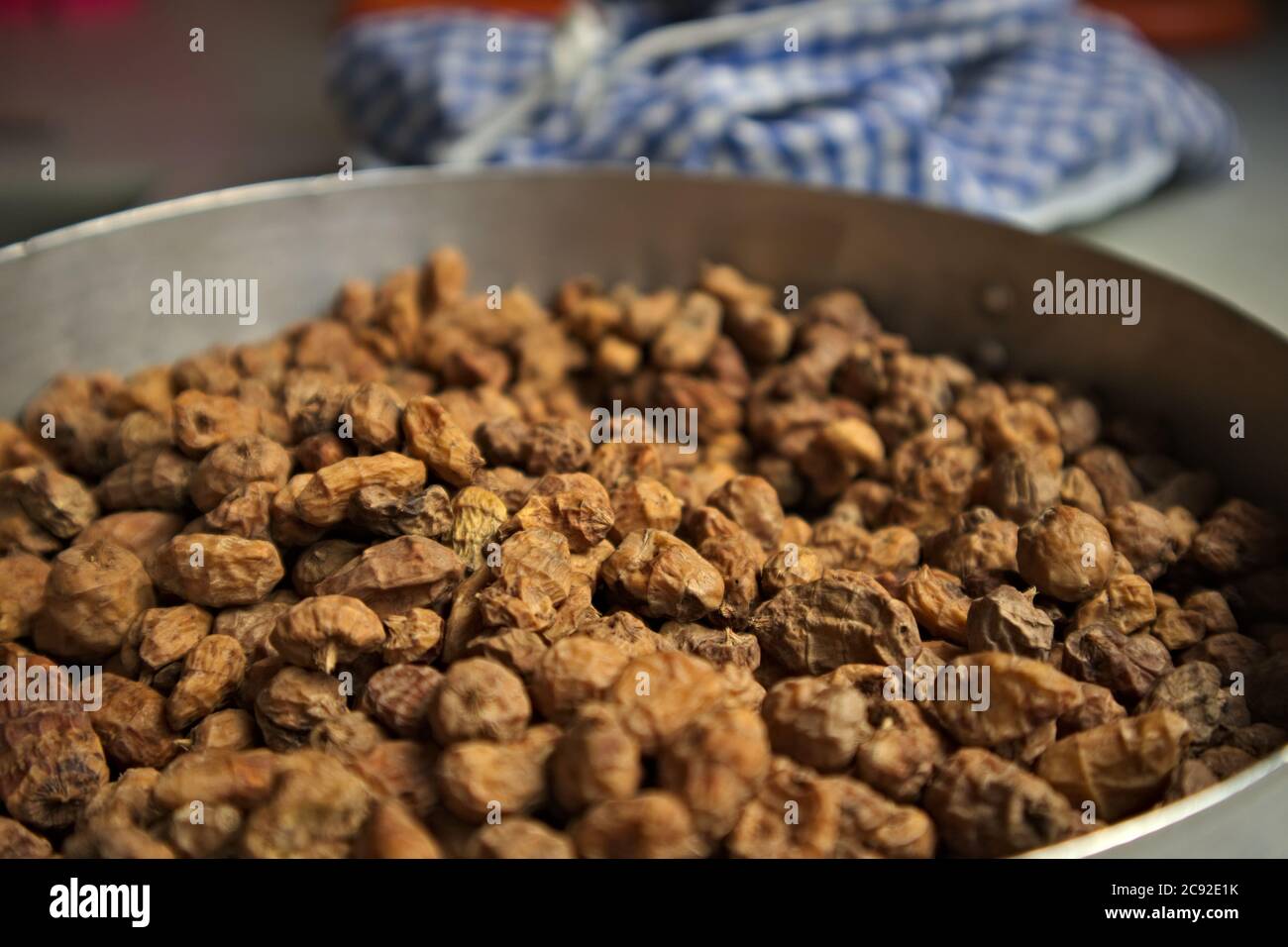 Close-up of a container full of dried tigernuts ready to transform into artisan liquid horchata Stock Photo