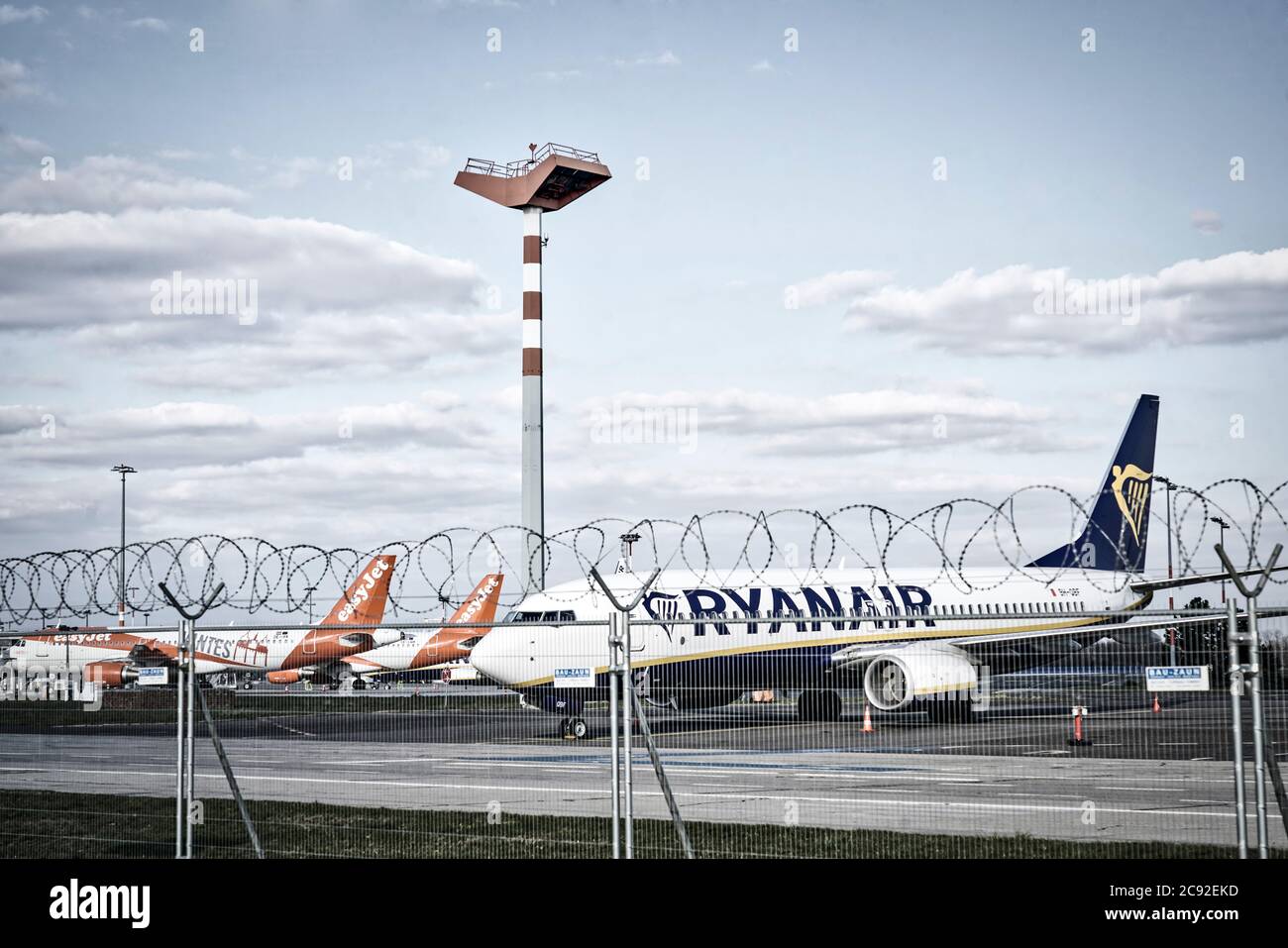 Easy Jet and Ryanair Airplanes parking at Airport Schoenefeld during Corona Crises, BER, Berlin, Germany Stock Photo