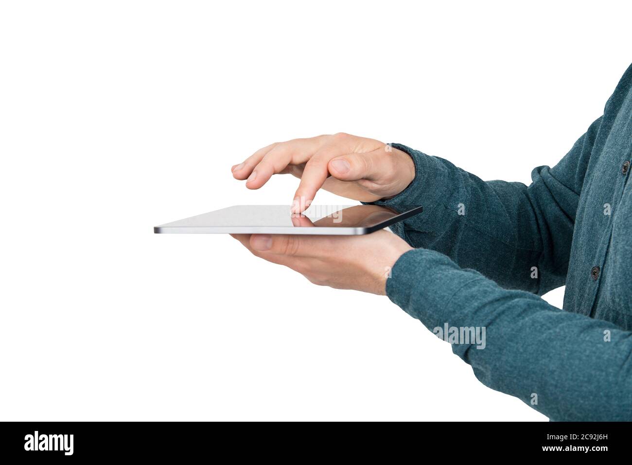 Close up person hands using a PC tablet as pressing the gadget display ...
