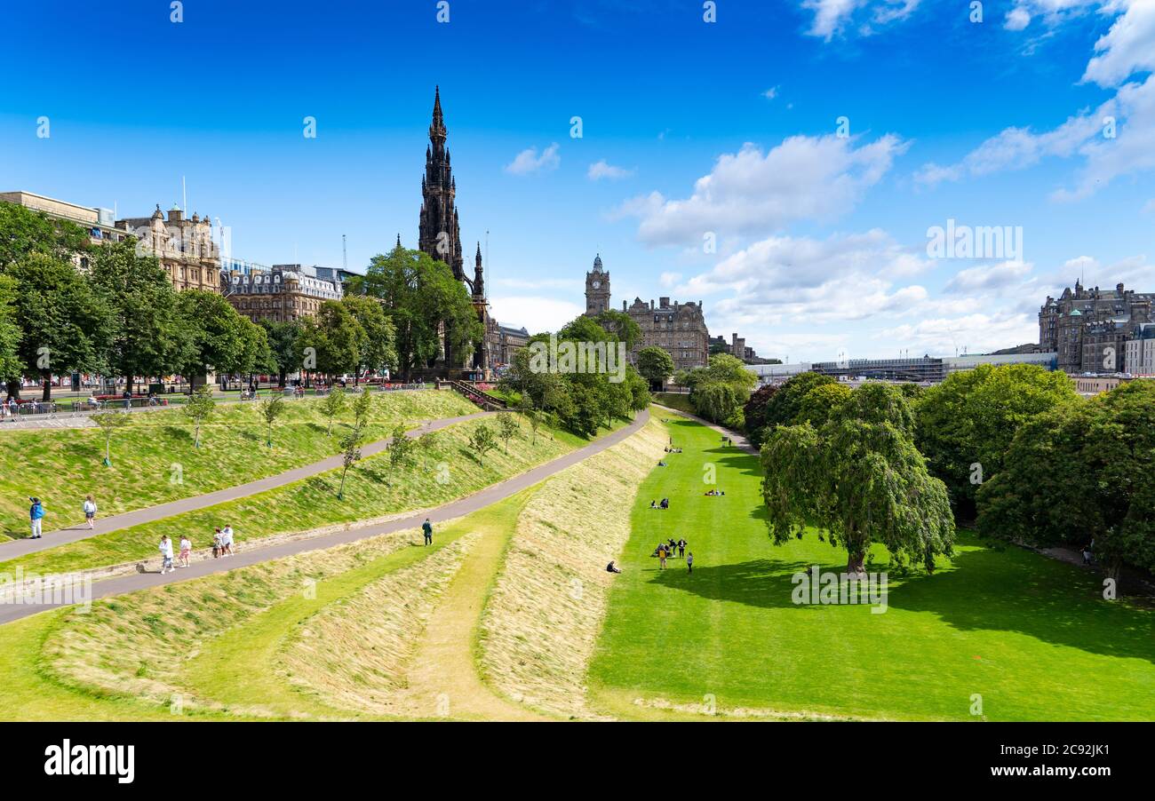 Edinburgh, Scotland, UK. 28 July, 2020. Business and tourism slowly returning to the shops and streets of Edinburgh city centre. The public returning to enjoy East Princes Street Gardens which have recently reopened after landscaping and drainage improvement works. Iain Masterton/Alamy Live News Stock Photo