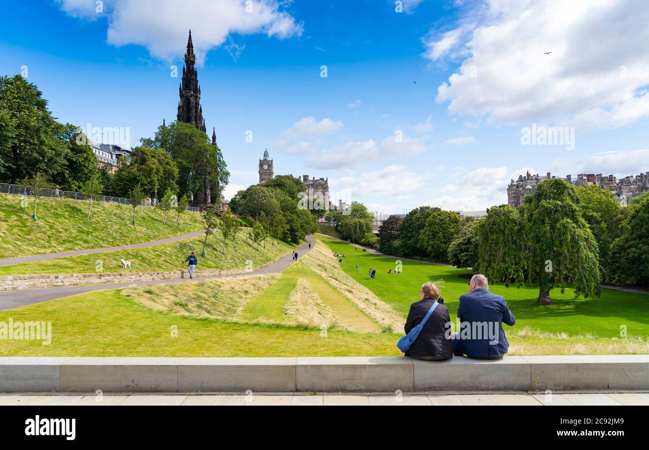 Edinburgh, Scotland, UK. 28 July, 2020. Business and tourism slowly returning to the shops and streets of Edinburgh city centre. The public returning to enjoy East Princes Street Gardens which have recently reopened after landscaping and drainage improvement works. Iain Masterton/Alamy Live News Stock Photo