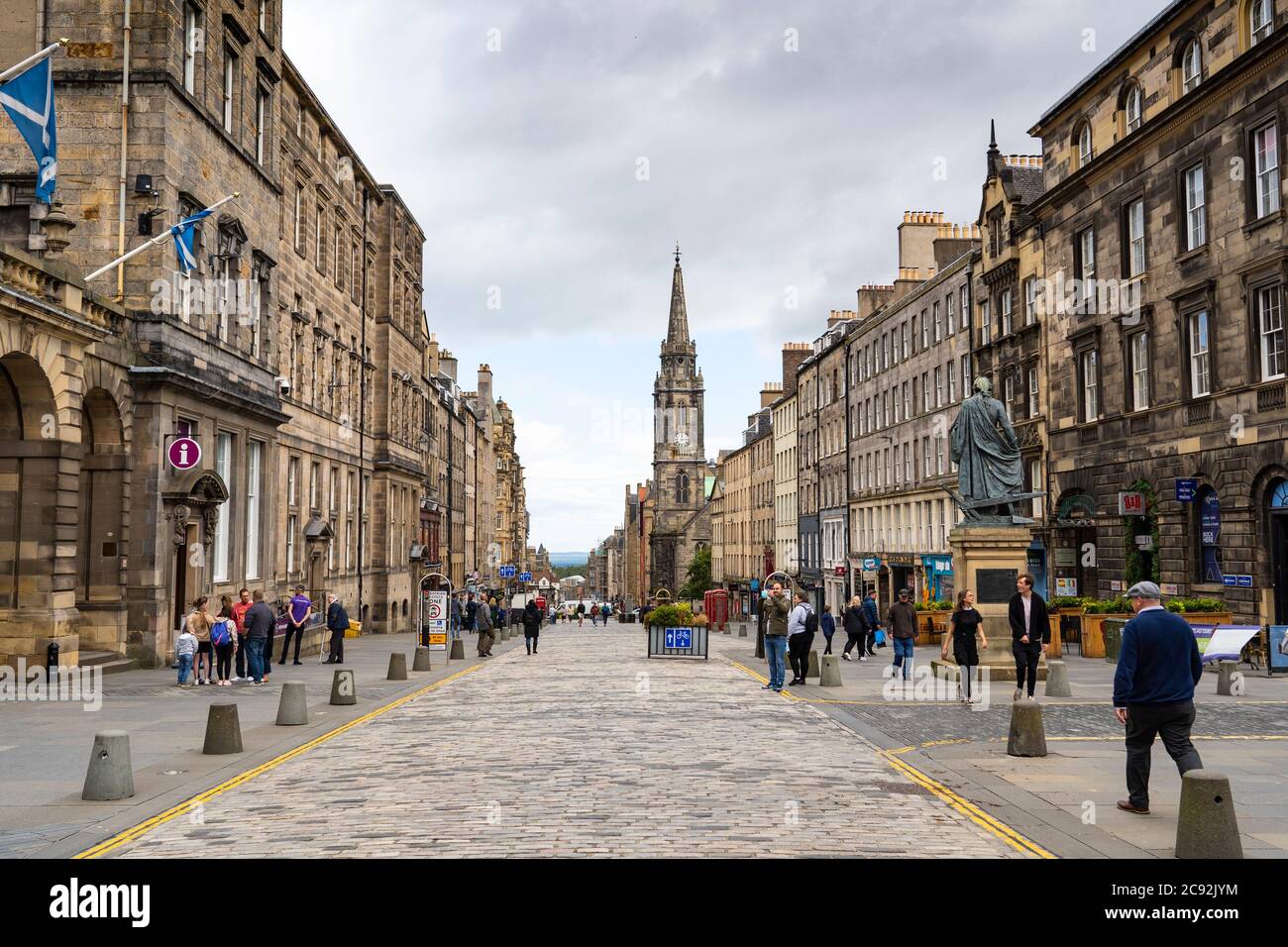 Edinburgh, Scotland, UK. 28 July, 2020. Business and tourism slowly returning to the shops and streets of Edinburgh city centre.View of the Royal Mile in the Old Town which is still much quieter than normal at this time of year.  Iain Masterton/Alamy Live News Stock Photo