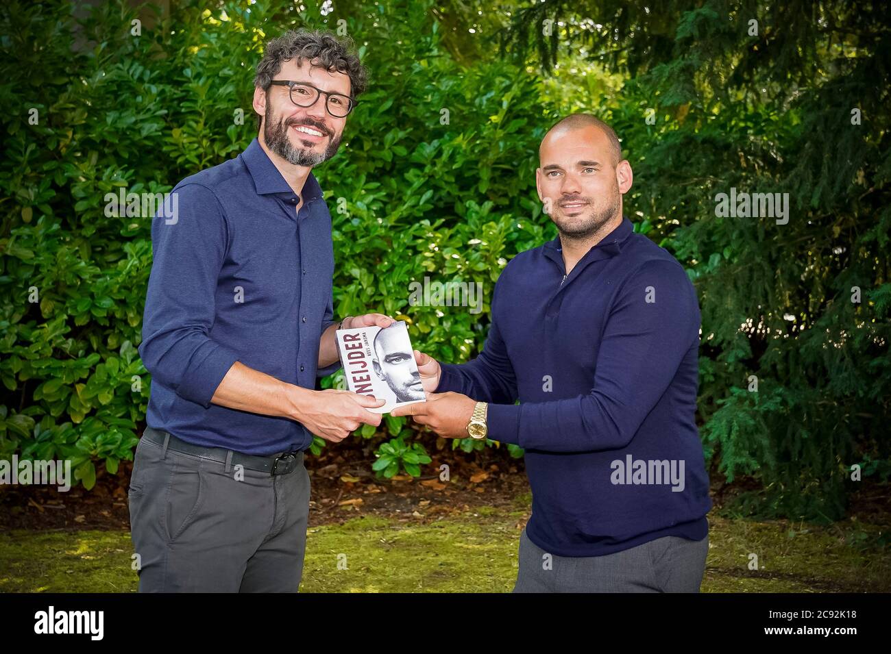 DOORN, Wesley Sneijder (R) presents his book Wesley, a biography written by Kees Jansma, Mark van Bommel (L) presents the first book, 27-06-2020, Oranjerie Doorn Credit: Pro Shots/Alamy Live News Stock Photo