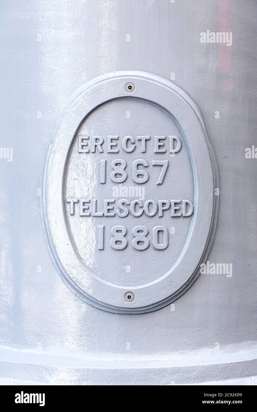 Preserved embossed sign on the Gasholders redevelopment in King's Cross 'Erected 1867, Telescoped 1880', Camden, London, UK Stock Photo