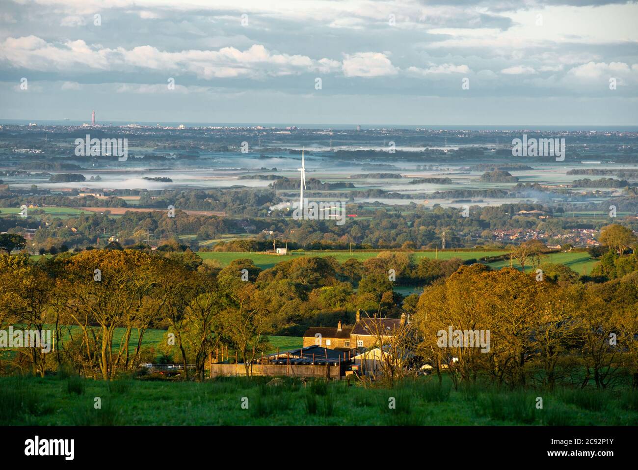 View over the Fylde towards Blackpool, Lancashire on a misty morning. Stock Photo