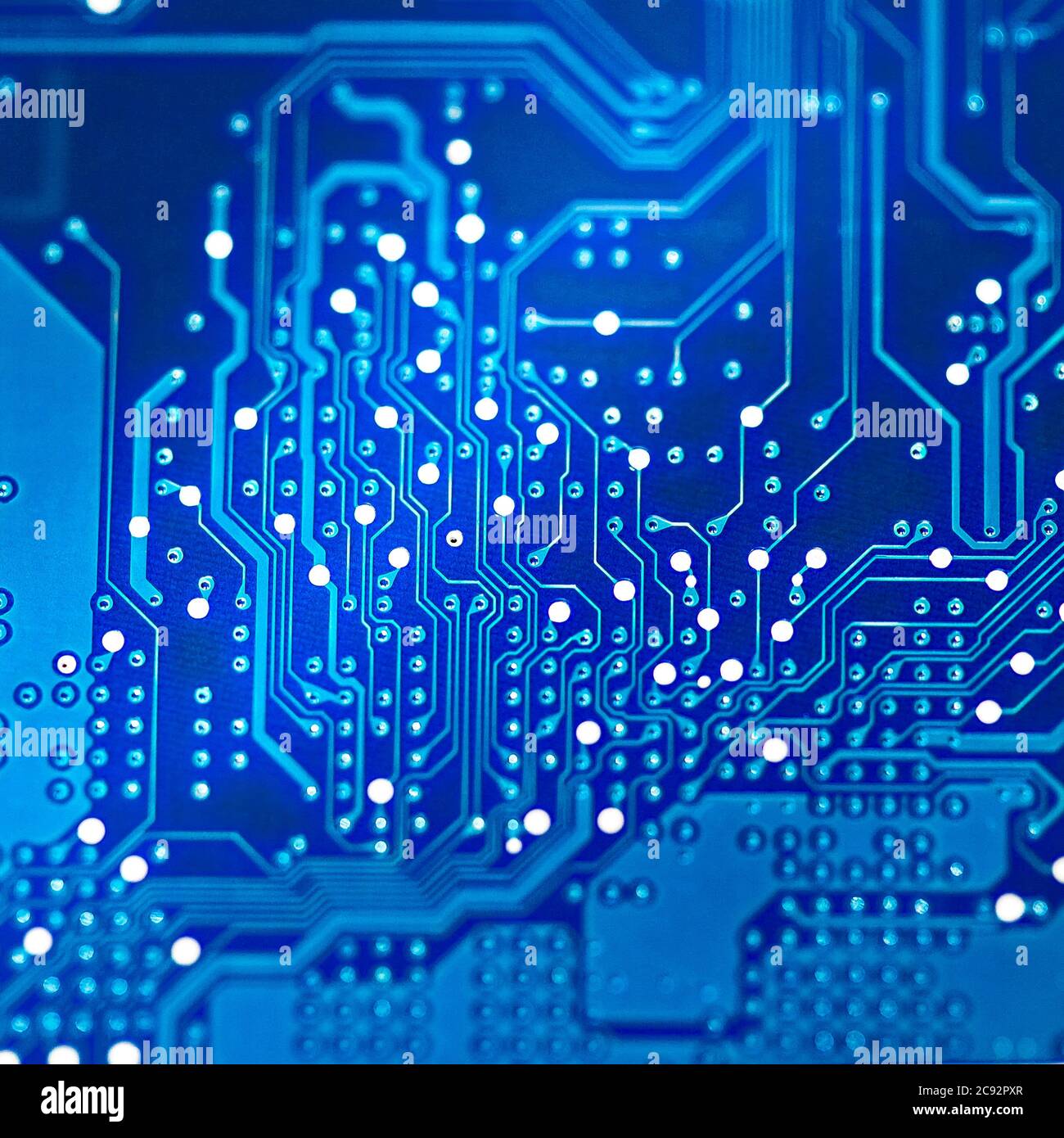 Detail of an electronic printed circuit board a blue color Stock Photo -  Alamy
