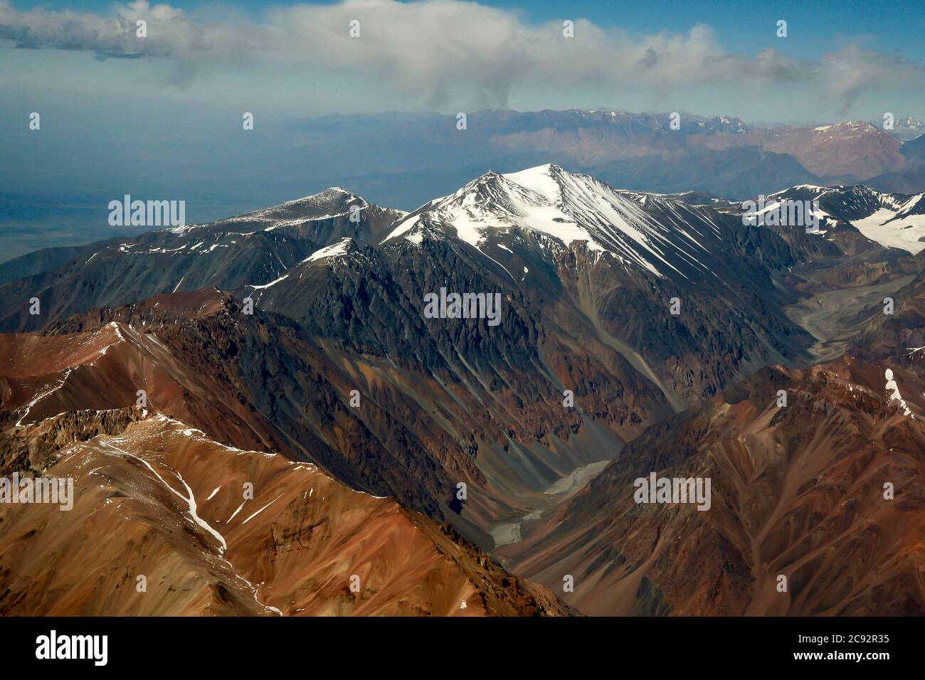 Andes mountains with glaciers and blue sky. Argentina Chile, aerial view Stock Photo