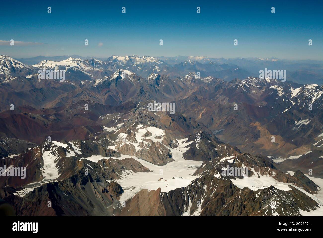 Andes mountains with glaciers and blue sky. Argentina Chile, aerial view Stock Photo