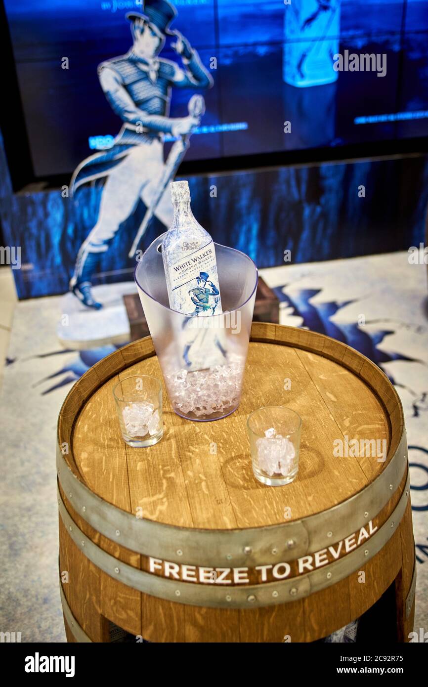 Game of Thrones themed White Walker whisky by Johnnie Walker being sold in the duty free area in the airside terminal of Luton Airport. The bottles spell out the words “Winter is here” when it's at the right temperature for serving. Stock Photo