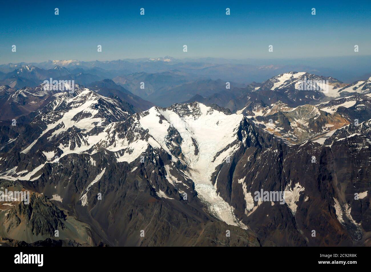 Andes mountains with glaciers and blue sky. Argentina Chile, aerial view Stock Photo