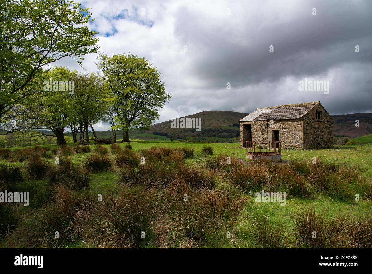 Landscape of upland farmland and stone barn and fells, Chipping, Preston, Lancashire. Stock Photo