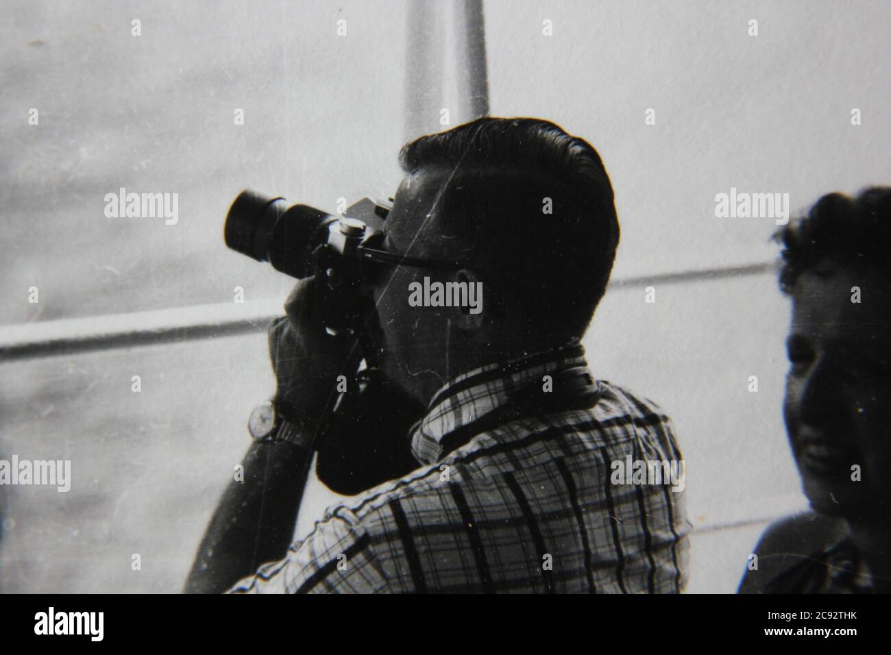 fine-1970s-vintage-black-and-white-photography-of-a-man-taking-a