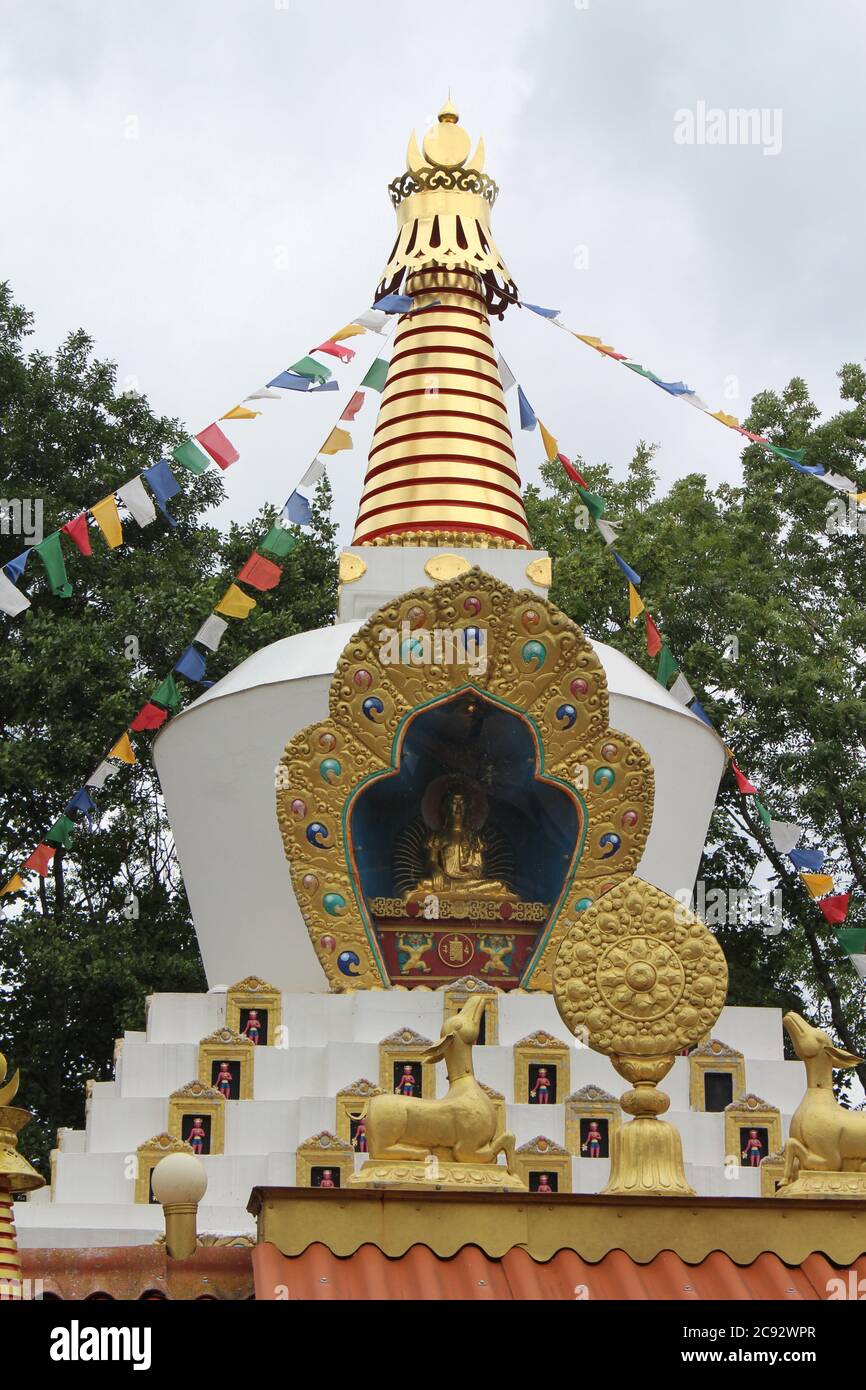 DOKKUM, NETHERLANDS, 23 JULY 2020: Traditional golden stupa of a tibetan buddhist temple. Karma Deleg Chö Phel Ling is a study and meditation centre i Stock Photo