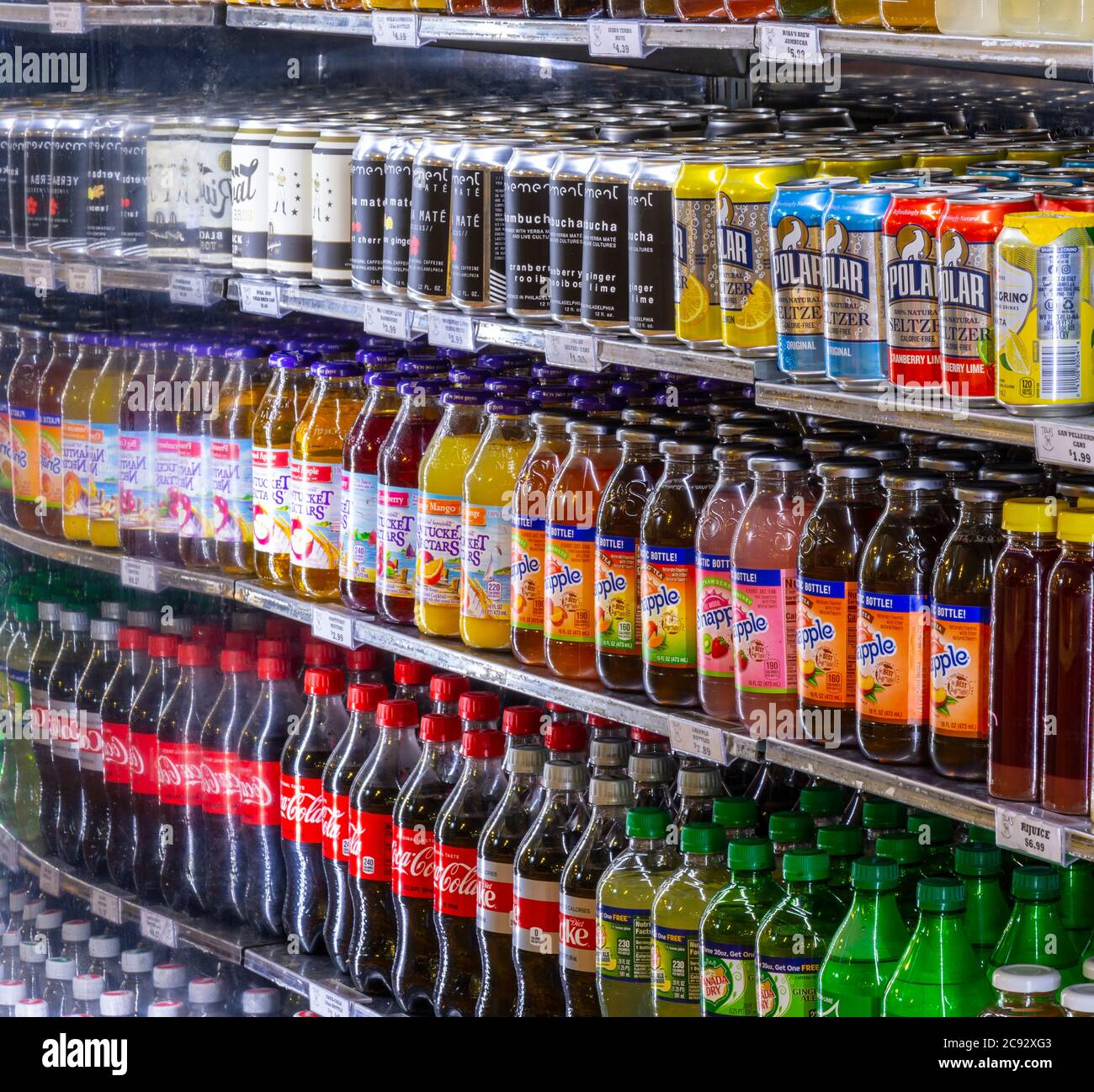 Beverages in refrigerated case in food market, Philadelphia, USA Stock Photo