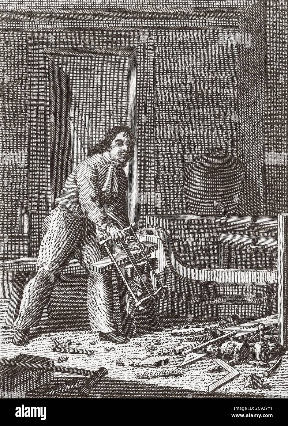 Peter the Great, Peter I or Pyotr Alexeyevich Romanov, 1672 – 1725.  Tsar of Russia.  Here seen working at carpentry in his house an Zaandam, Netherlands.  Peter spent time at Zaandam in 1697 studying ship building.  He lived in a small wooden house which today is a museum known as the Czar Peter House.  From a print by Meno Haas after a work by Schubert. Stock Photo