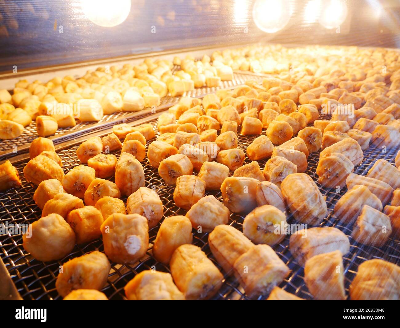 banana bake in oven, dry food process Stock Photo Alamy