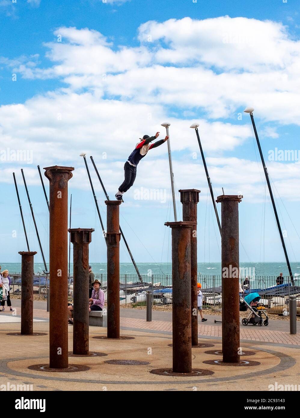Brighton UK 28th July 2020 A freerunner leaps across the Golden