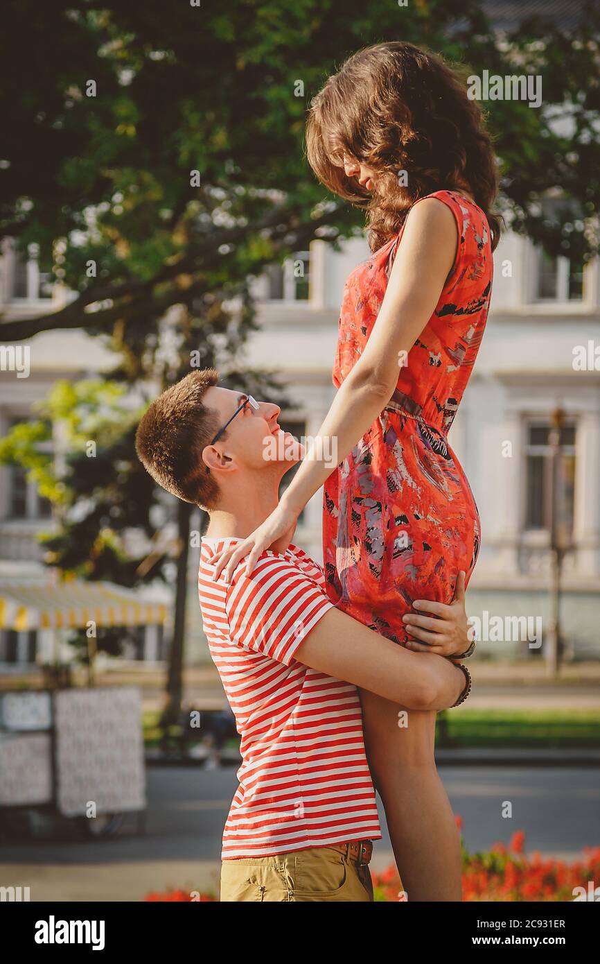 Young couple hugging teenager hi-res stock photography and images - Alamy