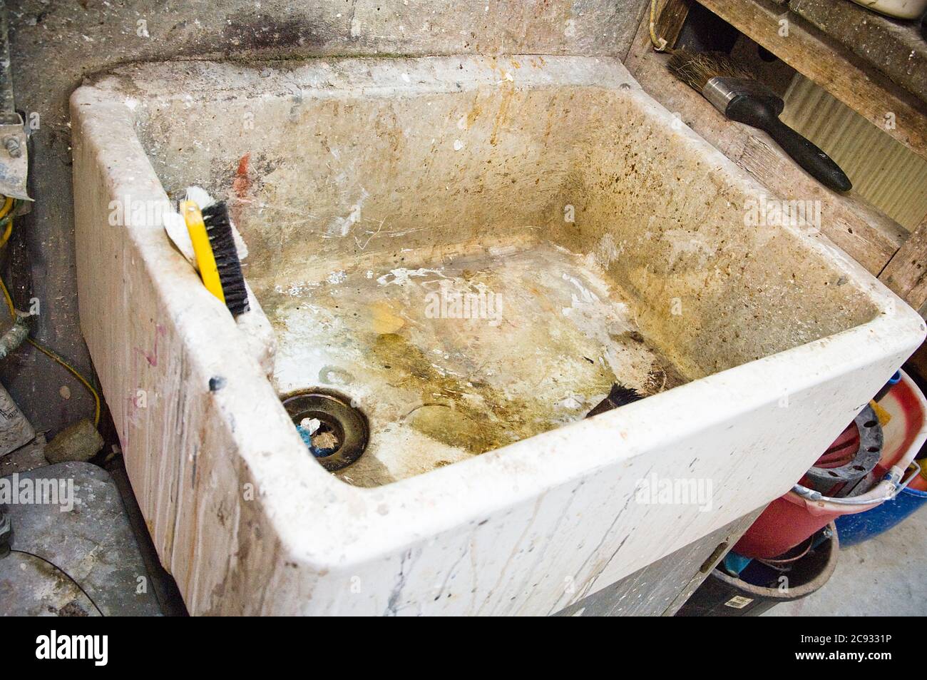 A dirty old butler sink Stock Photo Alamy
