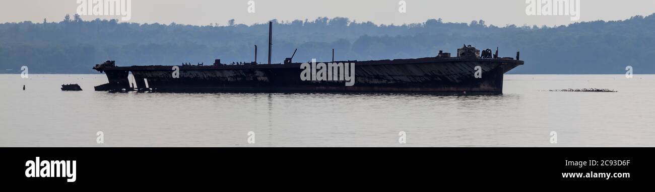 Panorama of an abandoned ship in Mallows bay of Potomac river. This place is home to remains of over 100 decommissioned and sunken ship wrecks and is Stock Photo